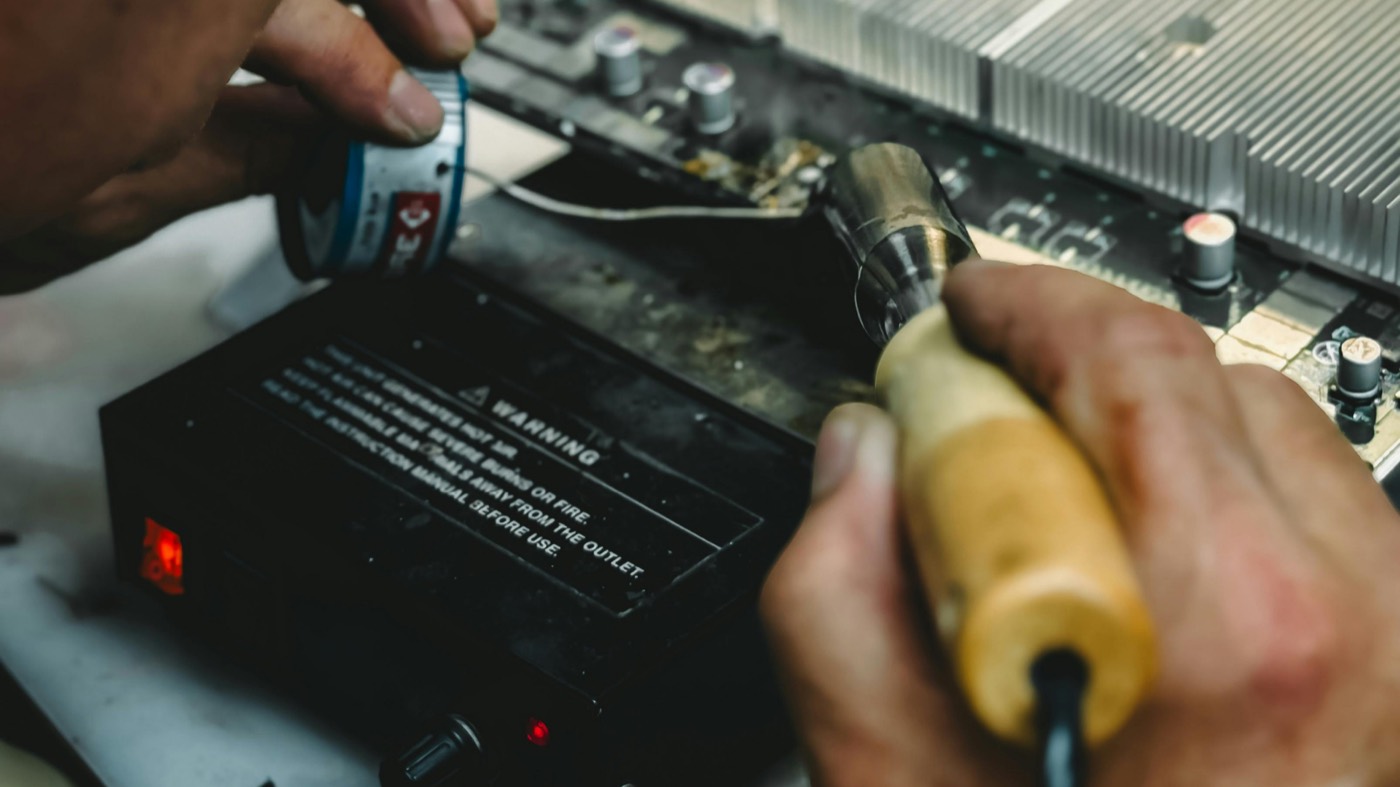 Industrial specialists installing sprinkler and calibration systems